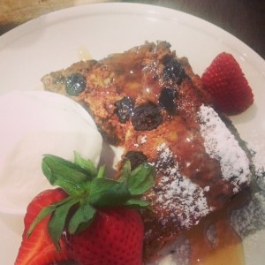 Red Cacao spiced carrot and date loaf drizzled with warm honey and served with fresh strawberries and natural yoghurt.